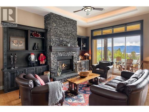 4531 Gaspardone Road, Kelowna, BC - Indoor Photo Showing Living Room With Fireplace