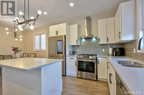 6429 Royal Magnolia Avenue, London, ON - Indoor Photo Showing Kitchen With Stainless Steel Kitchen With Double Sink With Upgraded Kitchen