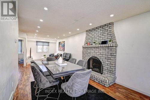 30 Maxwell Drive, Kitchener, ON - Indoor Photo Showing Dining Room With Fireplace