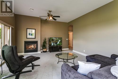 2304 Capistrano Drive, Kelowna, BC - Indoor Photo Showing Living Room With Fireplace
