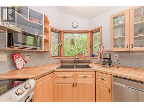 7025 97A Highway, Grindrod, BC - Indoor Photo Showing Kitchen With Double Sink