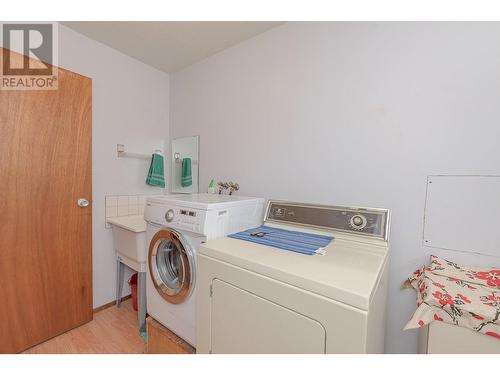 7025 97A Highway, Grindrod, BC - Indoor Photo Showing Laundry Room