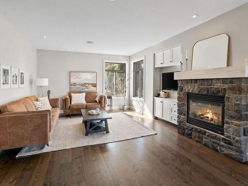 5040 Windsong Crescent, Kelowna, BC - Indoor Photo Showing Living Room With Fireplace
