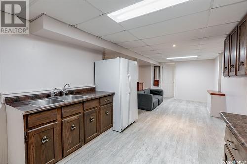 2226 Dewdney Avenue E, Regina, SK - Indoor Photo Showing Kitchen With Double Sink