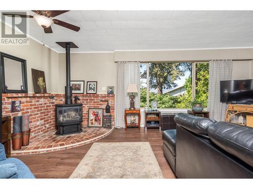 9705 Buchanan Road, Coldstream, BC - Indoor Photo Showing Living Room With Fireplace