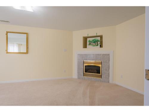 3311 Laburnum Drive, Trail, BC - Indoor Photo Showing Living Room With Fireplace