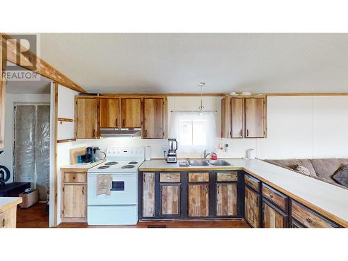 22 3387 Red Bluff Road, Quesnel, BC - Indoor Photo Showing Kitchen With Double Sink