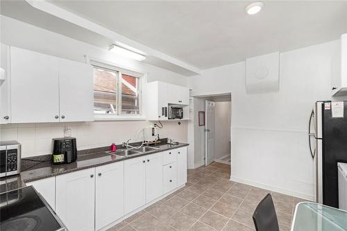 47 Clyde Street, Hamilton, ON - Indoor Photo Showing Kitchen With Double Sink