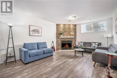 21 Sheppard'S Glen Drive, Ottawa, ON - Indoor Photo Showing Living Room With Fireplace