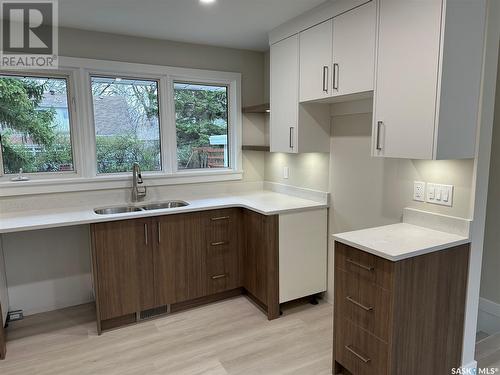 25 Lamont Crescent, Regina, SK - Indoor Photo Showing Kitchen With Double Sink