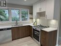 25 Lamont Crescent, Regina, SK  - Indoor Photo Showing Kitchen With Double Sink 