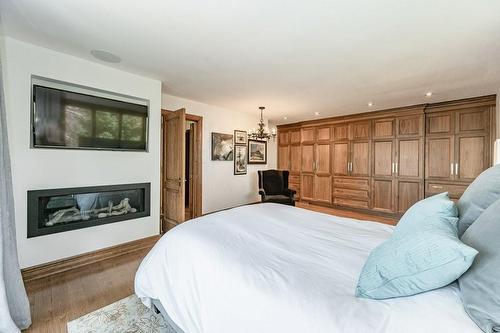 Your own gas fireplace to enjoy - 31 Hilts Drive, Hamilton, ON - Indoor Photo Showing Bedroom With Fireplace