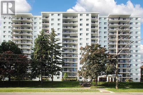 604 - 1100 Caven Street, Mississauga, ON - Outdoor With Balcony With Facade