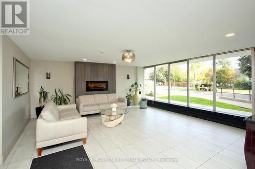 604 - 1100 Caven Street, Mississauga, ON - Indoor With Fireplace