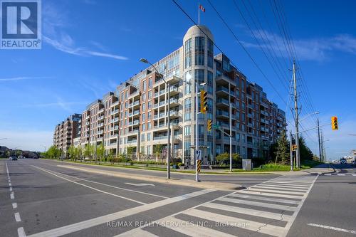 624 - 2480 Prince Michael Drive, Oakville, ON - Outdoor With Balcony With Facade