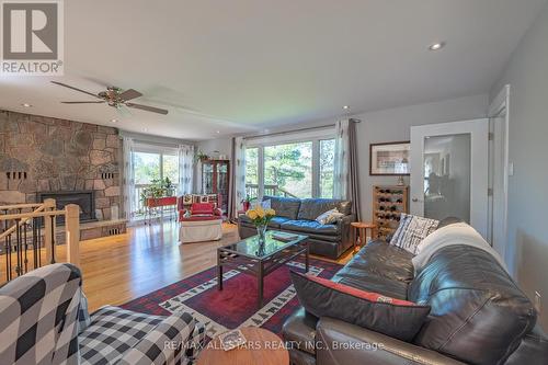 3374 Elm Tree Road, Kawartha Lakes, ON - Indoor Photo Showing Living Room With Fireplace