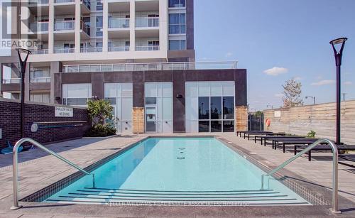 1112 - 1050 Main Street E, Milton, ON - Outdoor With In Ground Pool With Balcony