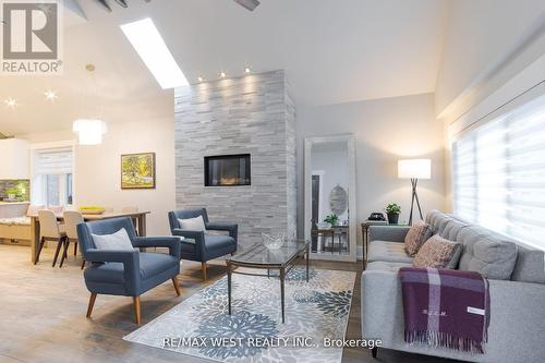 139 Springdale Boulevard, Toronto, ON - Indoor Photo Showing Living Room With Fireplace