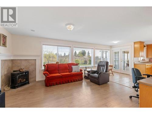 750 Douglas Road, West Kelowna, BC - Indoor Photo Showing Living Room With Fireplace