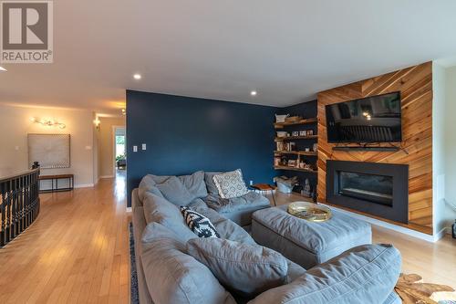 144 Vancouver Place, Penticton, BC - Indoor Photo Showing Living Room With Fireplace