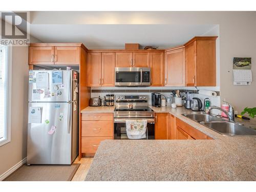 3363 Wilson Street Unit# 126, Penticton, BC - Indoor Photo Showing Kitchen With Double Sink