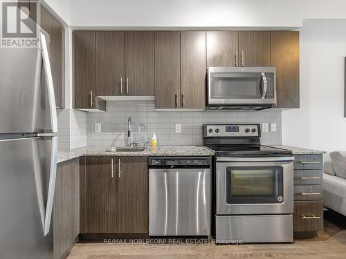 218 - 3600 Highway 7, Vaughan, ON - Indoor Photo Showing Kitchen With Upgraded Kitchen