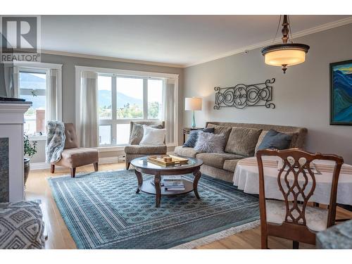 305 - 550 Rainbow Drive, Kaslo, BC - Indoor Photo Showing Living Room With Fireplace