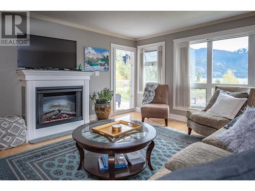 550 Rainbow Drive Unit# 305, Kaslo, BC - Indoor Photo Showing Living Room With Fireplace