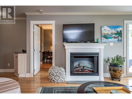 550 Rainbow Drive Unit# 305, Kaslo, BC - Indoor Photo Showing Living Room With Fireplace