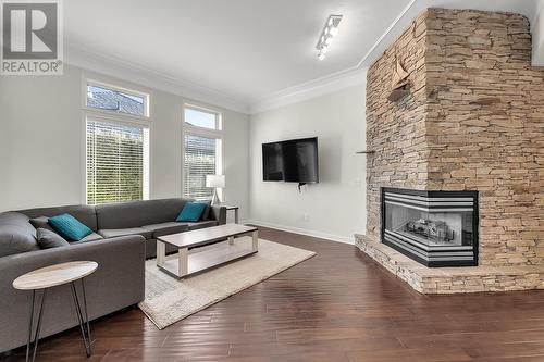 3037 Quail Crescent, Kelowna, BC - Indoor Photo Showing Living Room With Fireplace