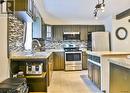 176 Elm St N, Timmins, ON  - Indoor Photo Showing Kitchen With Upgraded Kitchen 