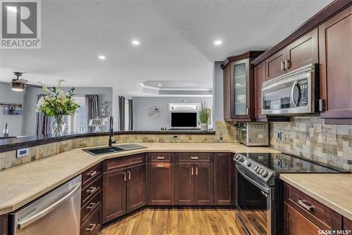 318 Lakeridge Drive, Warman, SK - Indoor Photo Showing Kitchen With Double Sink