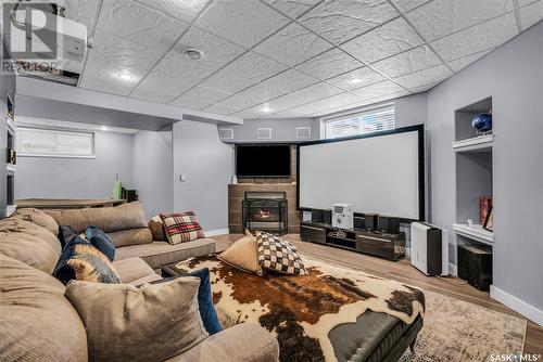 318 Lakeridge Drive, Warman, SK - Indoor Photo Showing Basement With Fireplace