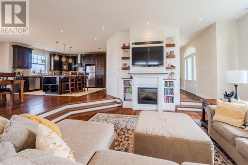 10-14 Murrays Road, Harbour Main, NL - Indoor Photo Showing Living Room With Fireplace