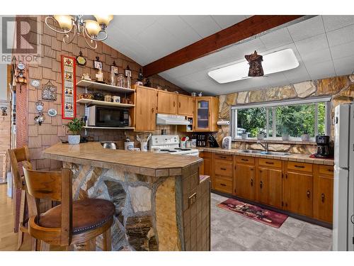 7553 Stampede Trail, Anglemont, BC - Indoor Photo Showing Kitchen With Double Sink