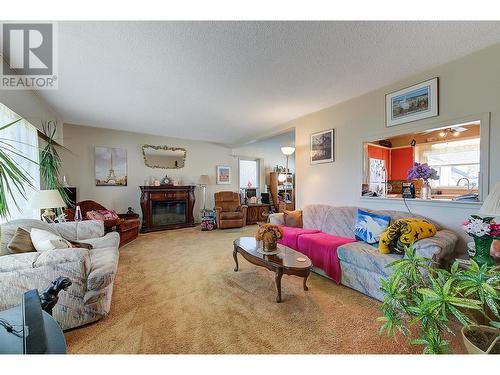 540 Patterson Avenue, Kelowna, BC - Indoor Photo Showing Living Room With Fireplace