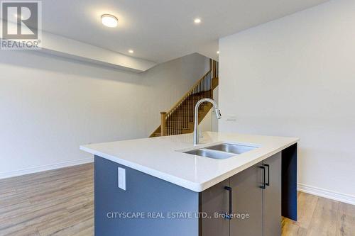 29 Edminston Drive, Centre Wellington, ON - Indoor Photo Showing Kitchen With Double Sink