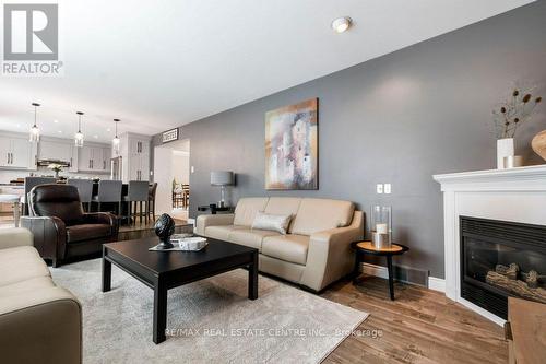 18 Mclachlan Place, Guelph, ON - Indoor Photo Showing Living Room With Fireplace