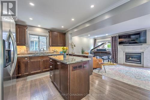 1845 Mickleborough Drive, London, ON - Indoor Photo Showing Kitchen With Fireplace