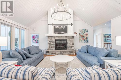 3691 Brunel Road, Huntsville, ON - Indoor Photo Showing Living Room With Fireplace