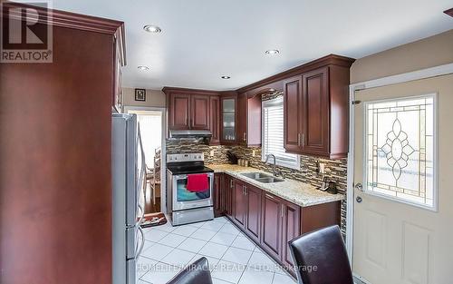 9 Banting Crescent, Brampton, ON - Indoor Photo Showing Kitchen With Double Sink