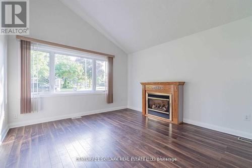 13 Cornwall Road, Brampton, ON - Indoor Photo Showing Living Room With Fireplace