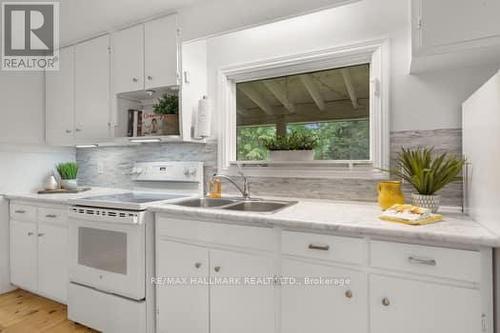 77 Woods Road, Carling, ON - Indoor Photo Showing Kitchen With Double Sink