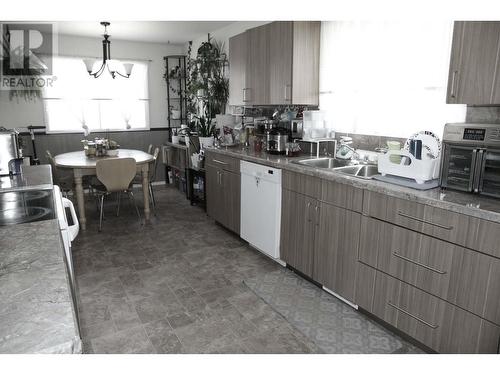 9116 92A Street, Fort St. John, BC - Indoor Photo Showing Kitchen With Double Sink