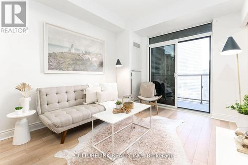 3207 - 28 Ted Rogers Way, Toronto, ON - Indoor Photo Showing Living Room