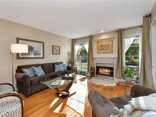 20-4619 Elk Lake Dr, Saanich, BC - Indoor Photo Showing Living Room With Fireplace