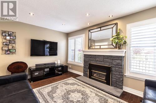 23 Jaffa Drive, Brampton, ON - Indoor Photo Showing Living Room With Fireplace