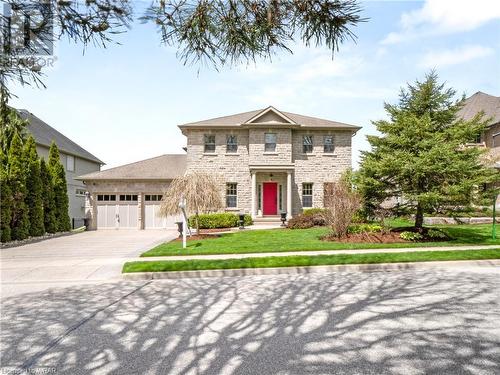Enjoy small town living, only steps from the banks of the meandering Grand River and trails, yet only a 10 minute drive from the perks and amenities of Waterloo and Elmira. - 110 Golf Course Road, Woolwich, ON - Outdoor With Facade