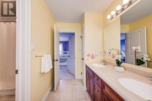 Shared between two of the secondary bedrooms is the ""jack and jill"" style 5pc bathroom which includes a separate water closet and two linen closets. - 110 Golf Course Road, Woolwich, ON - Indoor Photo Showing Bathroom