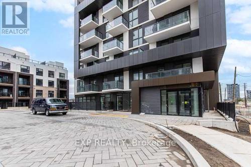 606 - 335 Wheat Boom Drive, Oakville, ON - Outdoor With Balcony With Facade